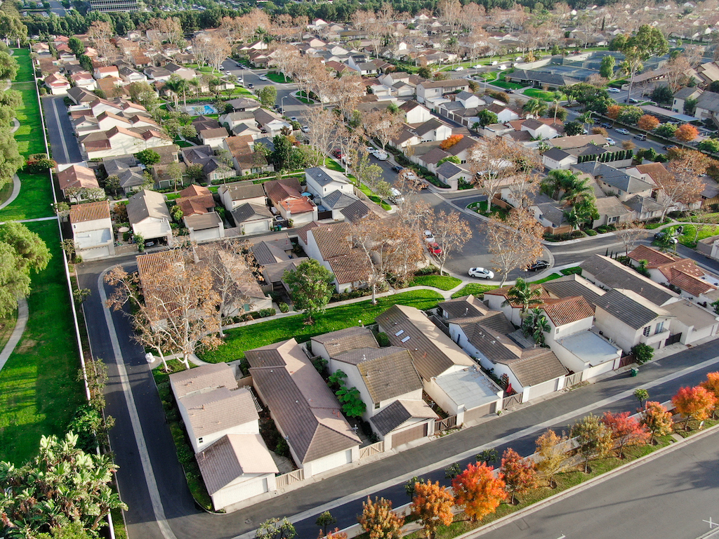 Aerial view of middle class suburban neighborhood with houses next to each other in Irvine